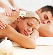 couple side by side getting massage